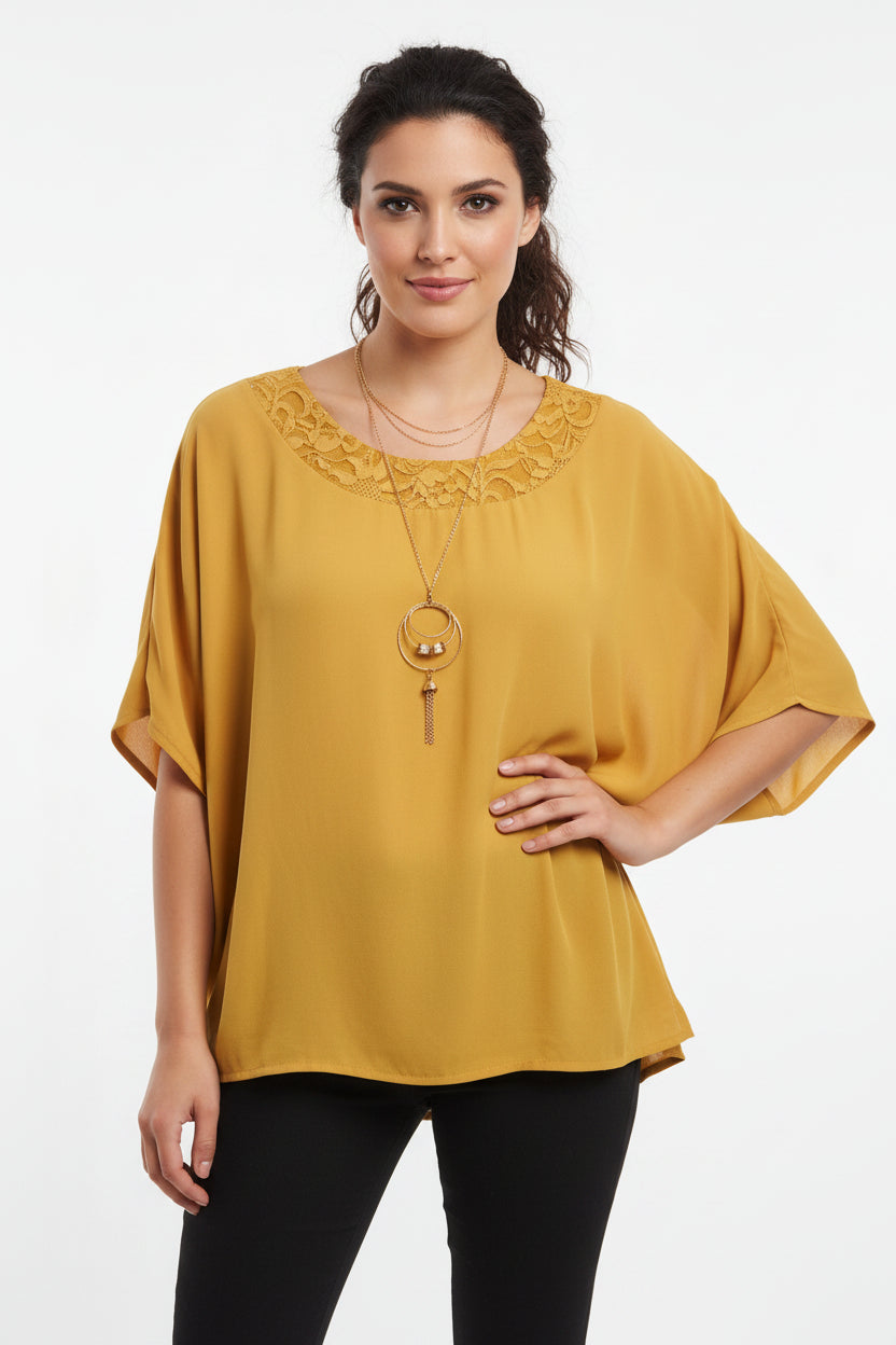 Blusa color con collar