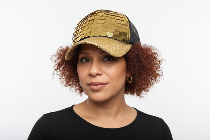 Gorra  con  lentejuela dorada con negro