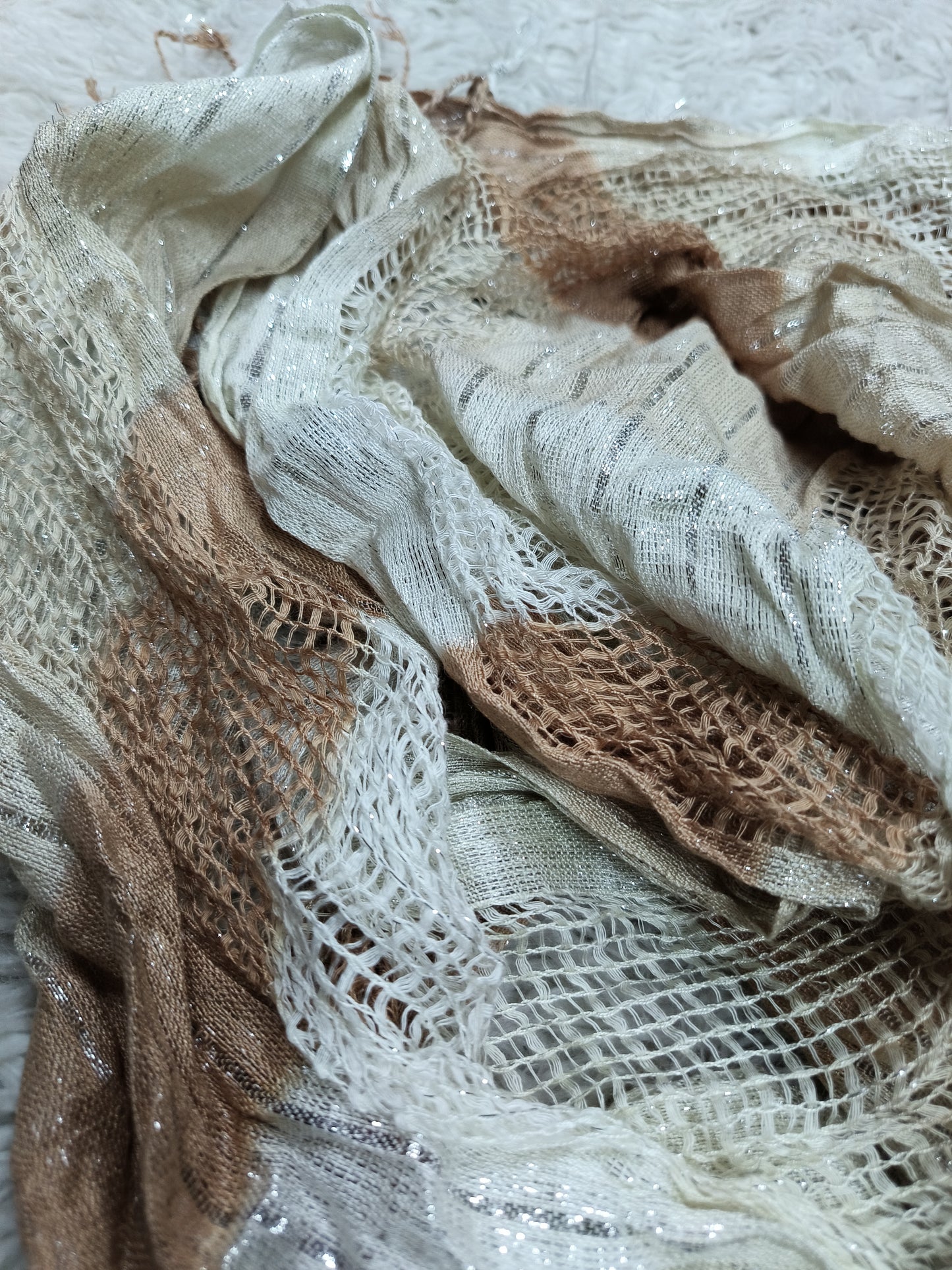 Elegant scarf with a touch of sparkle for any occasion Note: This product is not shipped without a minimum purchase required for shipping.