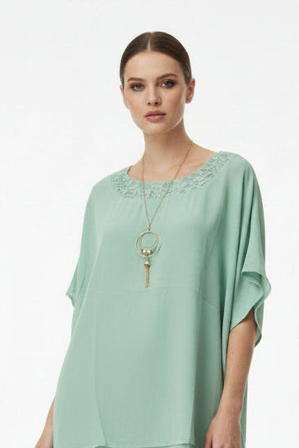 Blusa color con collar