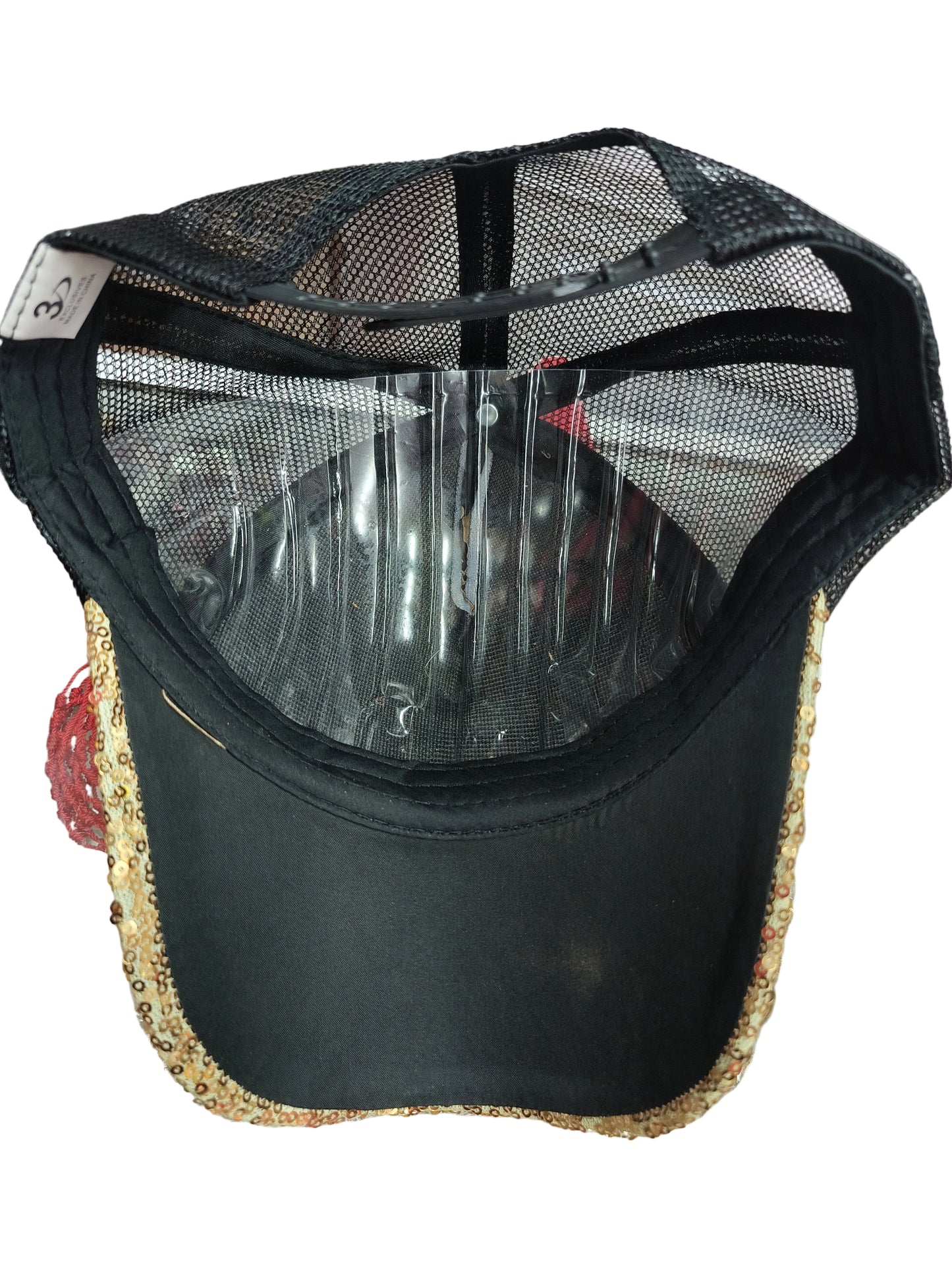 Gorra  con  lentejuela dorada con negro